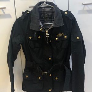 Women’s Barbour International belted jacket.